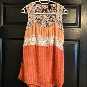 Flowy sleeveless top with peek-a-boo back